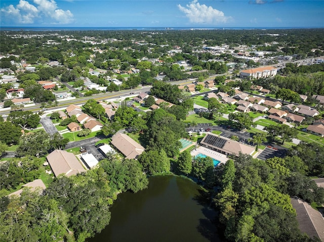 bird's eye view with a water view