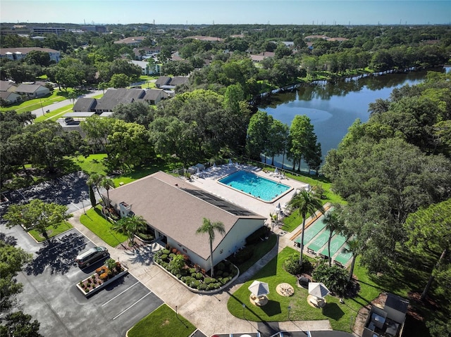 birds eye view of property featuring a water view