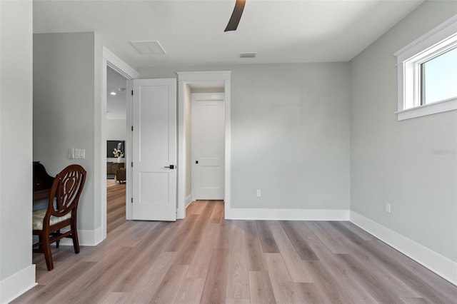 interior space featuring ceiling fan and light wood-type flooring