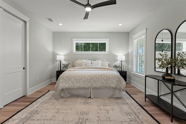 bedroom featuring ceiling fan and hardwood / wood-style floors