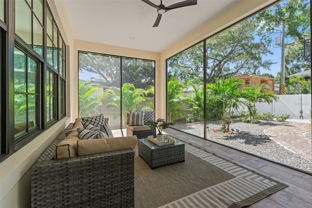 sunroom / solarium with ceiling fan