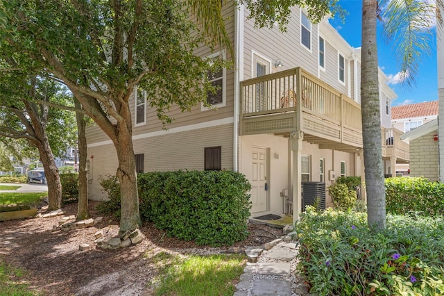 exterior space featuring a balcony and central AC unit