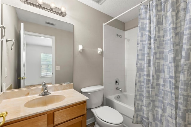 full bathroom with vanity, shower / bathtub combination with curtain, a textured ceiling, and toilet