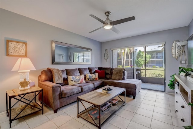 tiled living room featuring ceiling fan