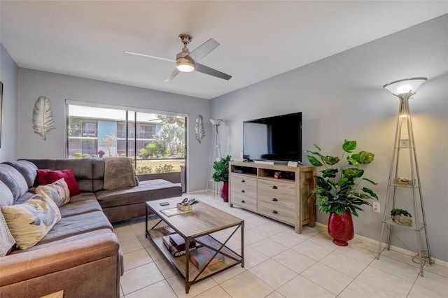 tiled living room featuring ceiling fan