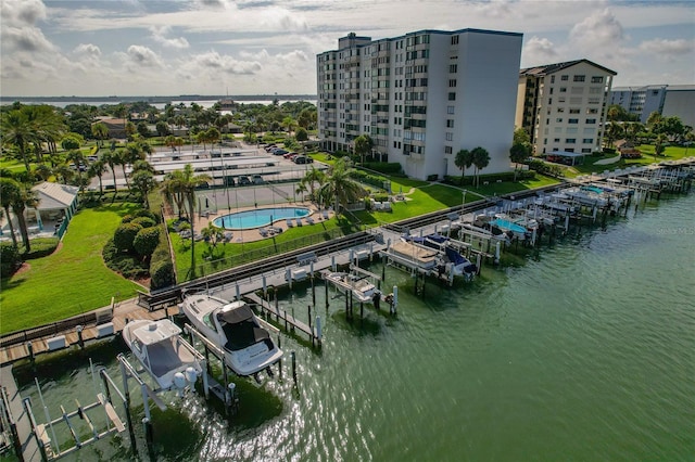 birds eye view of property with a water view