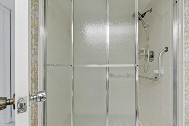 bathroom featuring an enclosed shower