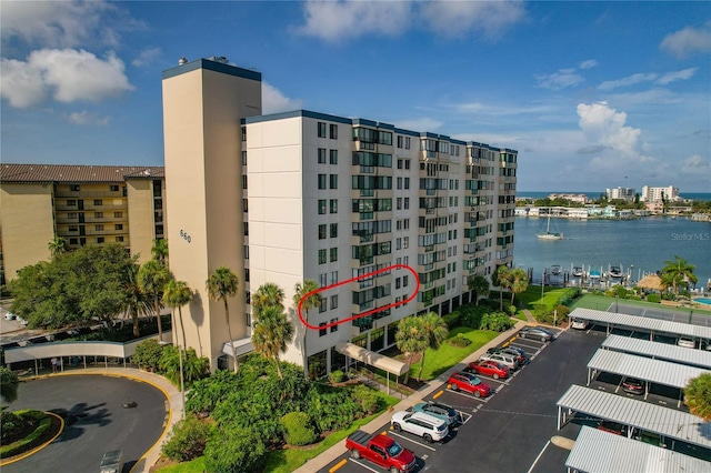 view of building exterior with a water view