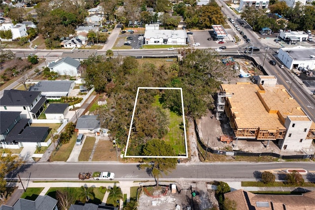 birds eye view of property with a residential view
