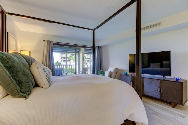 bedroom featuring light wood-type flooring