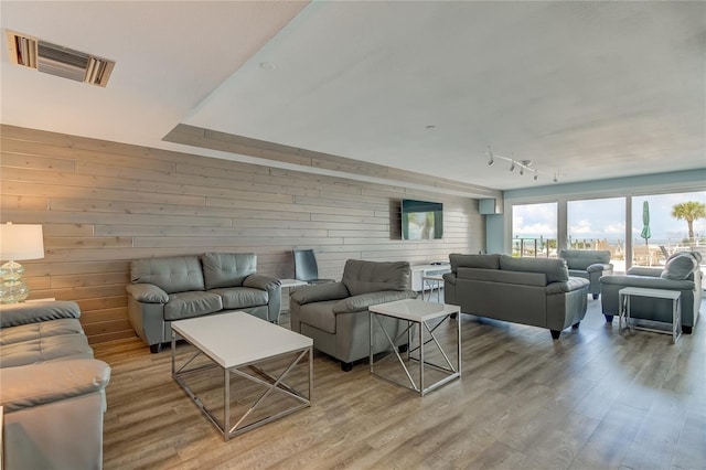 living room with light hardwood / wood-style floors