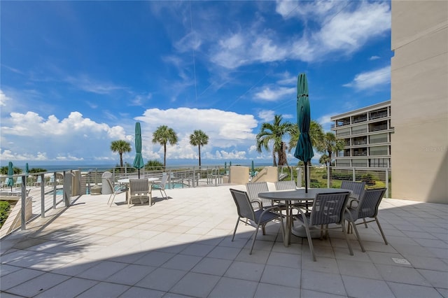 view of patio / terrace featuring a water view