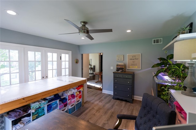 office featuring dark wood-type flooring and ceiling fan