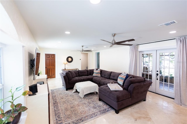 living room with french doors and ceiling fan