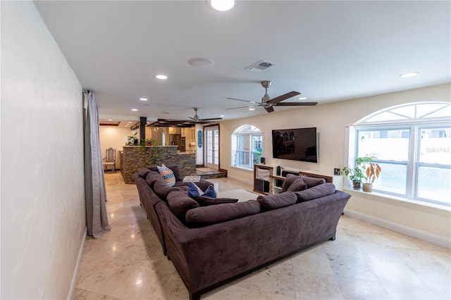 living room with ceiling fan