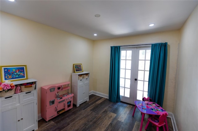 playroom with french doors and dark hardwood / wood-style flooring