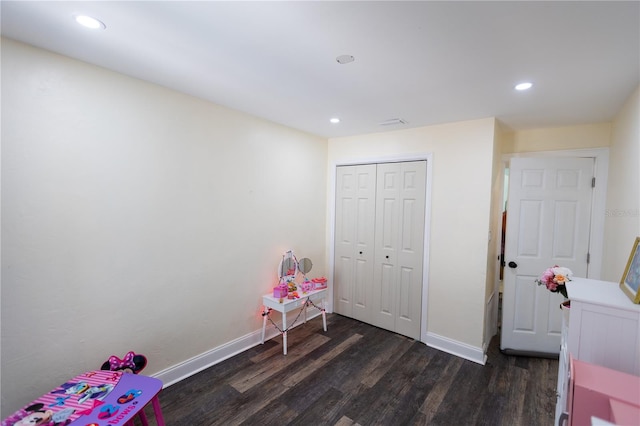 recreation room featuring dark hardwood / wood-style flooring