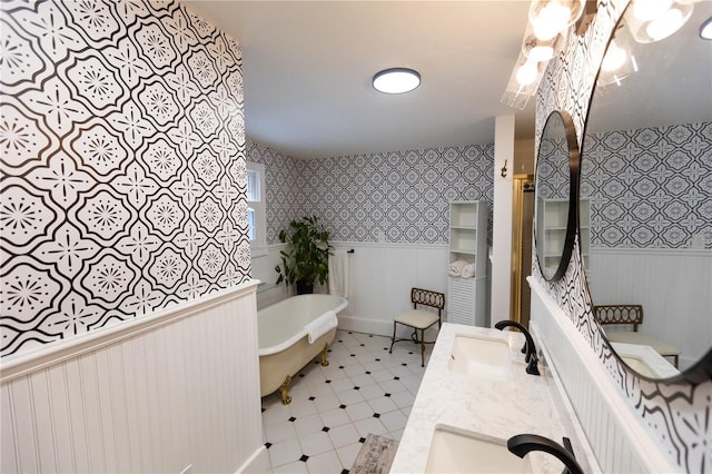 bathroom featuring vanity and a bathtub