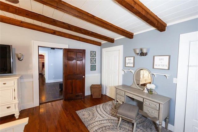 home office with dark wood-type flooring and vaulted ceiling with beams