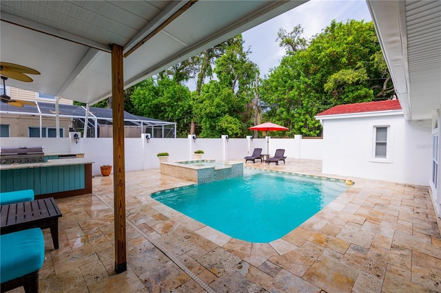 view of pool featuring an in ground hot tub, area for grilling, a patio area, and a bar