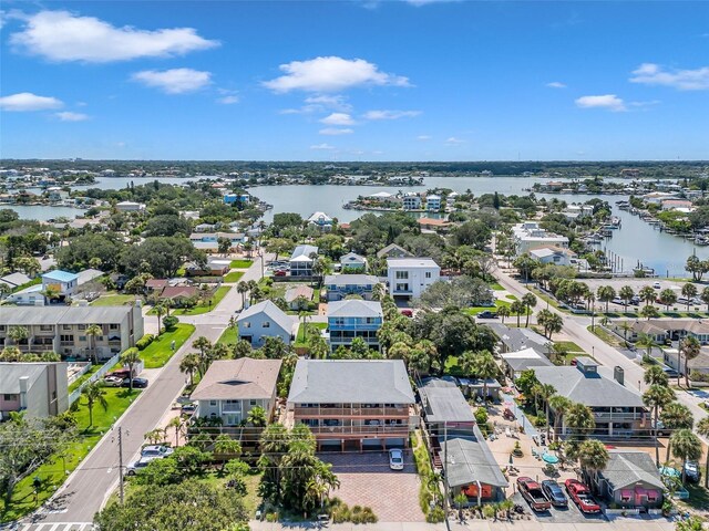 bird's eye view with a residential view and a water view