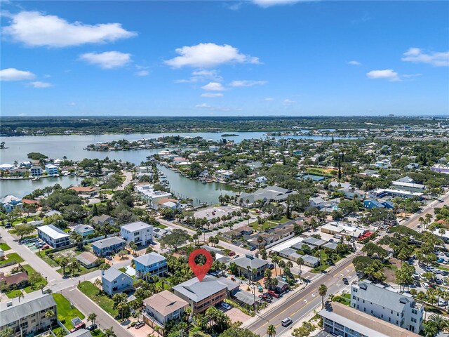 birds eye view of property with a water view and a residential view