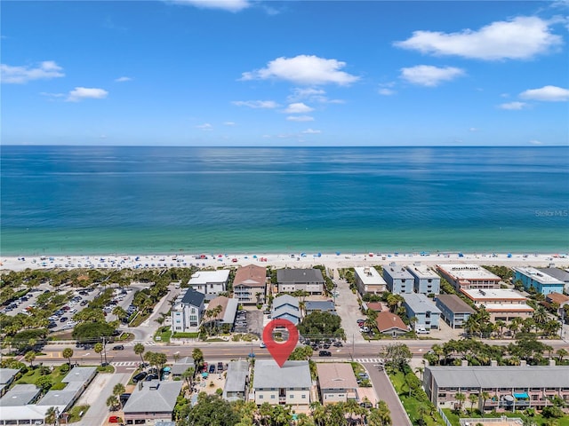 drone / aerial view with a view of the beach and a water view