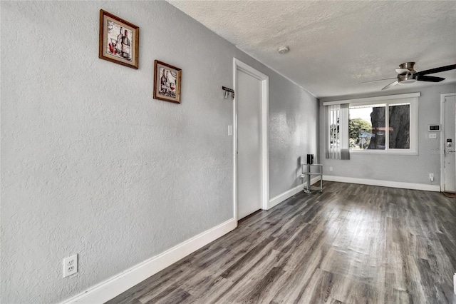 interior space with a textured ceiling, ceiling fan, and hardwood / wood-style floors