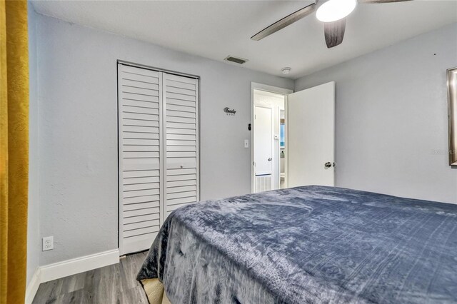 bedroom featuring wood-type flooring and ceiling fan