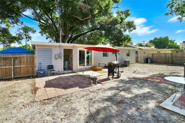 back of property with a patio area