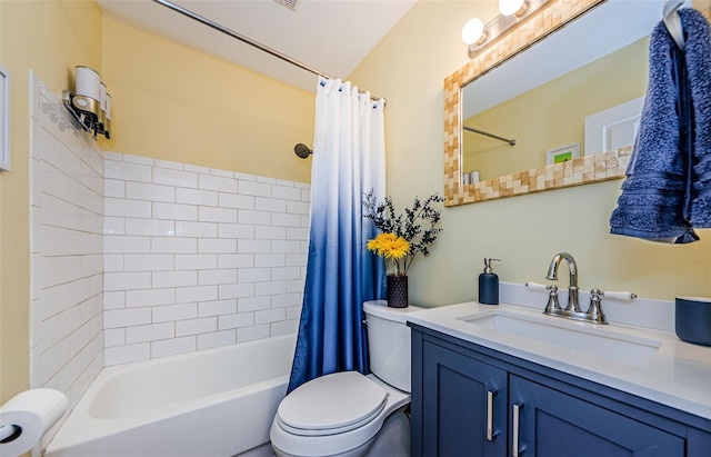 full bathroom with vanity, toilet, and shower / bath combo