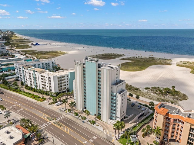 bird's eye view featuring a beach view and a water view