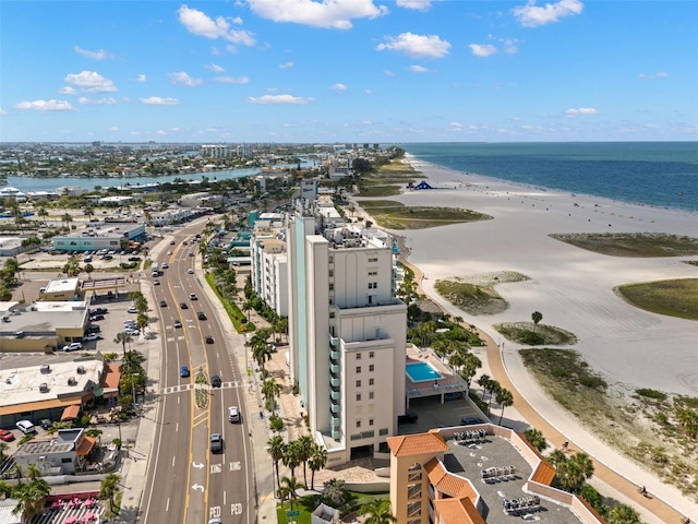 bird's eye view featuring a view of the beach and a water view