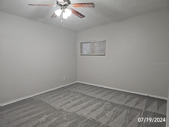 535 Monterey Blvd NE, Saint Petersburg, FL 33704 - carpeted empty room with ceiling fan and a textured ceiling