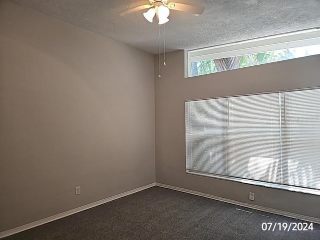 535 Monterey Blvd NE, Saint Petersburg, FL 33704 - carpeted empty room with ceiling fan and a textured ceiling