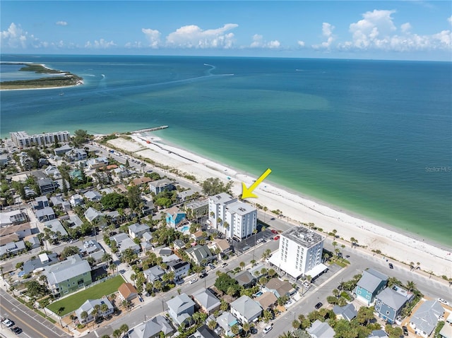 birds eye view of property featuring a view of the beach and a water view