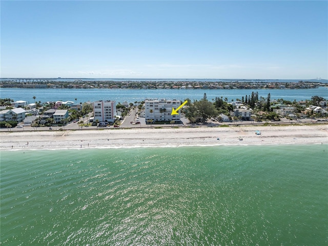 birds eye view of property featuring a water view and a view of the beach