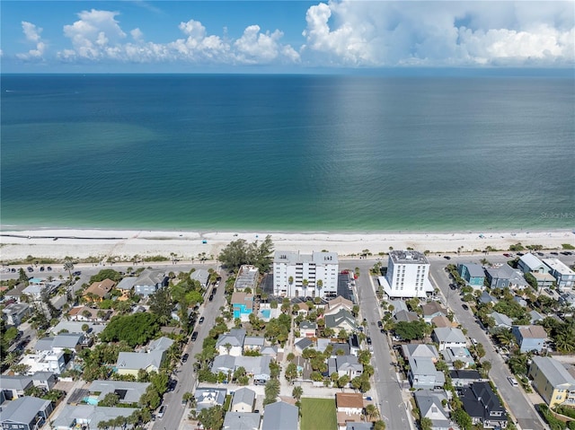 bird's eye view featuring a water view and a view of the beach