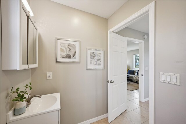 bathroom with vanity and tile patterned flooring