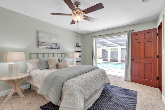 carpeted bedroom with access to exterior and ceiling fan