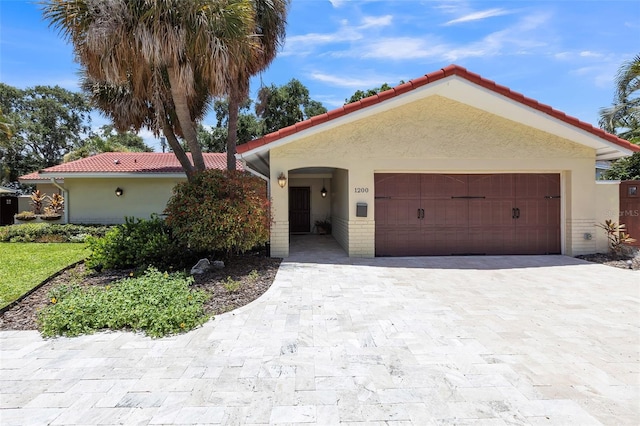 view of front of home with a garage