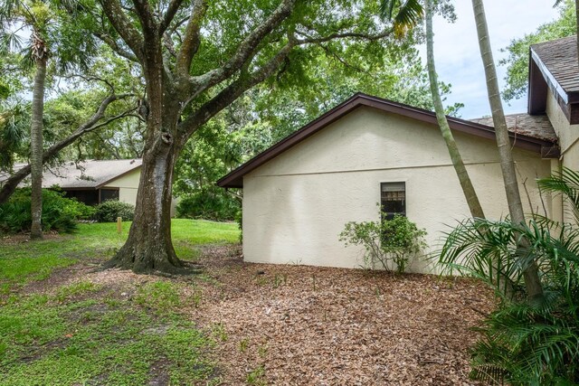 view of home's exterior featuring a yard