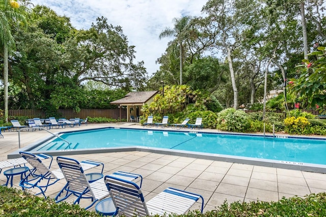 view of swimming pool featuring a patio