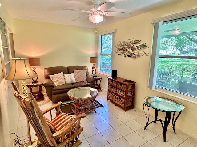 tiled living room with ceiling fan