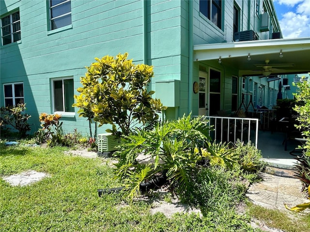 view of home's exterior with ceiling fan