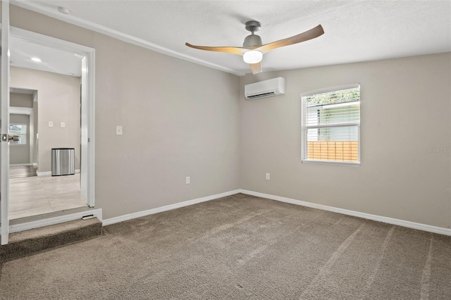 empty room with ceiling fan, a wall mounted AC, vaulted ceiling, and carpet