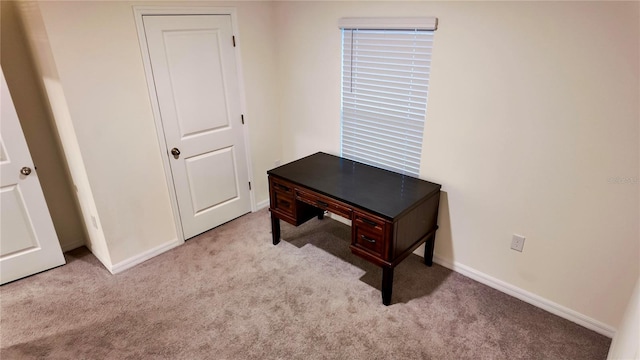 home office featuring light colored carpet