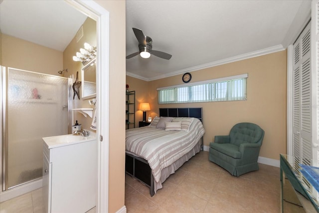 bedroom with crown molding, sink, ceiling fan, and a closet