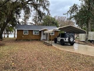 ranch-style home with a carport