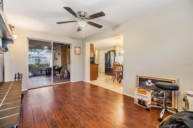 interior space featuring ceiling fan and hardwood / wood-style floors